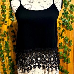 Super cute and flattering black tank top!